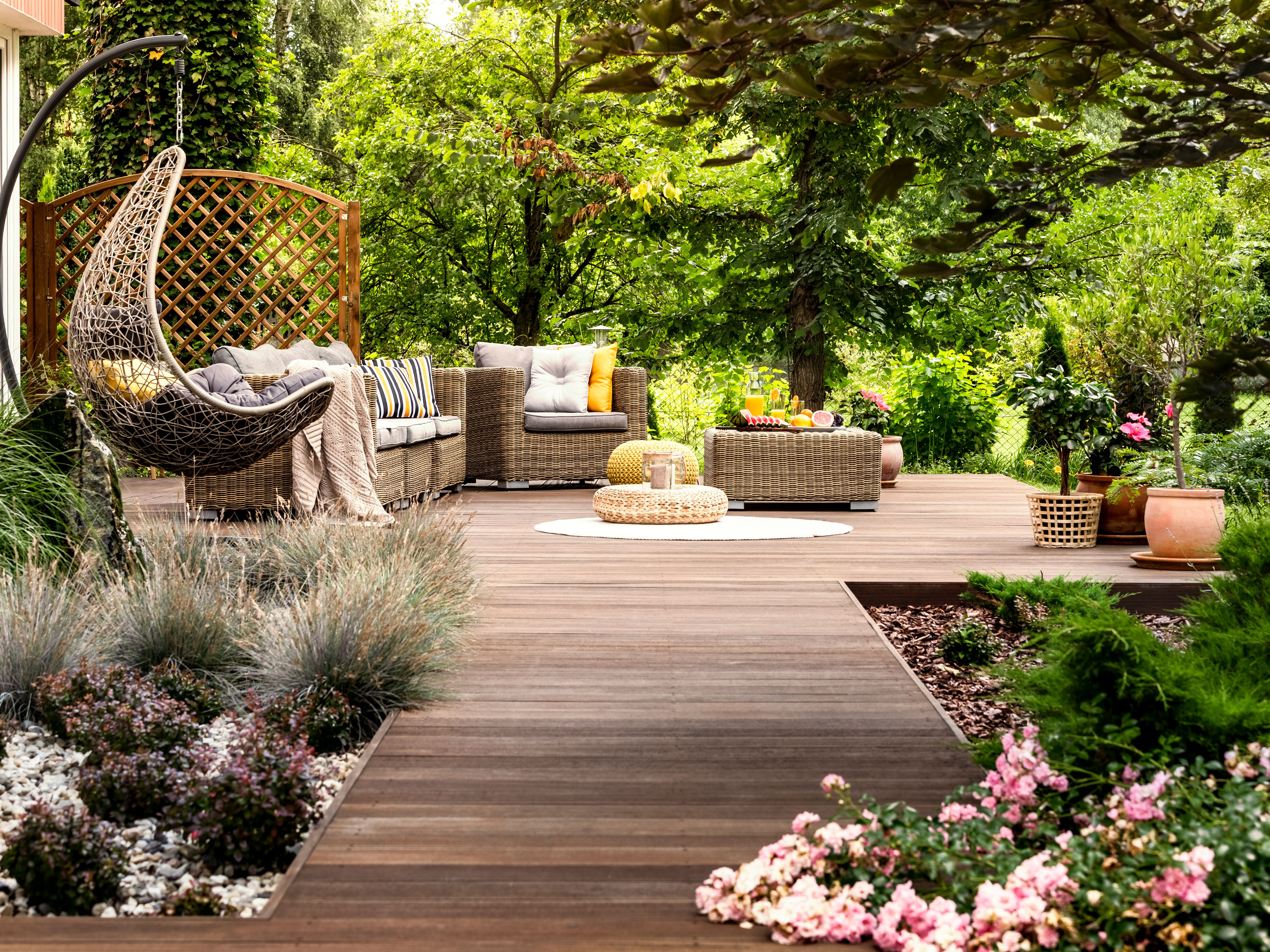 Landscape design with colorful flower beds and shrubs